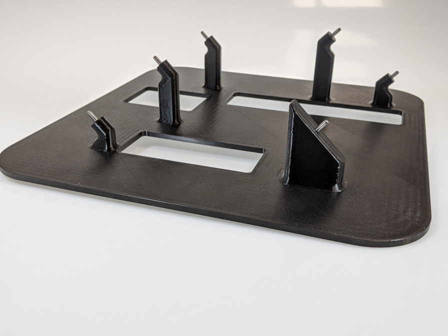 This X-ray guide is used to ensure automotive sensors are kept in place during production and to guarantee product repeatability. It is printed with ULTEM™ 9085 resin.