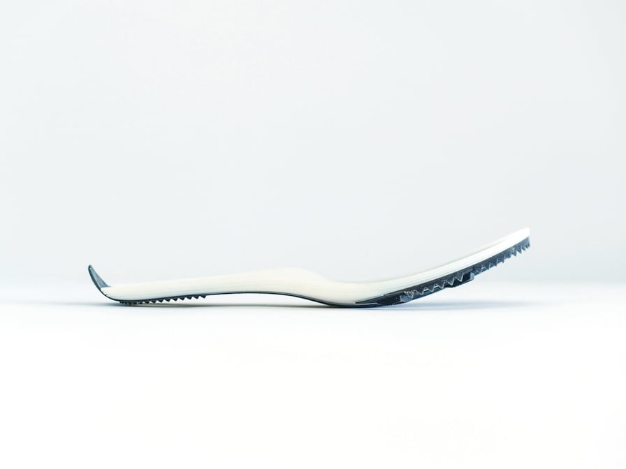 Prototype of a sole unit for a Brooks racing track spike.