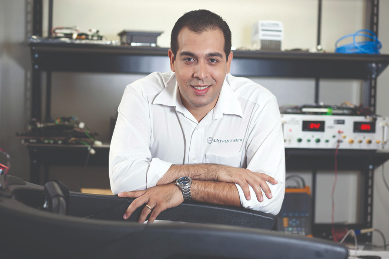 Victor Xavier, supervisor of the engineering department of Brudden, next to the Objet30 3D printer.
