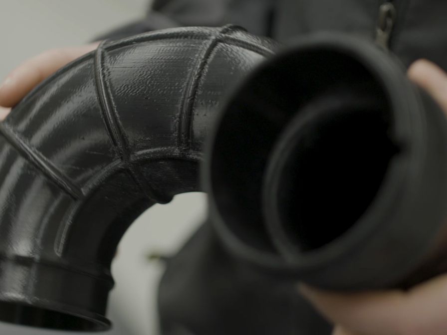 3d printed part being held in hands