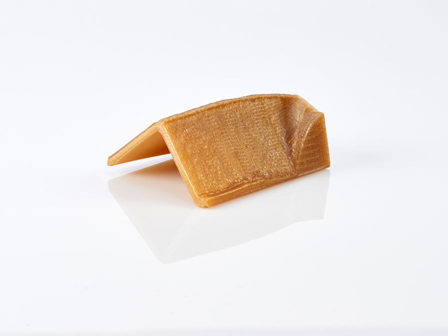 A 3D printed lay-up tool capable of high-temperature and high-pressure autoclave cure cycles.