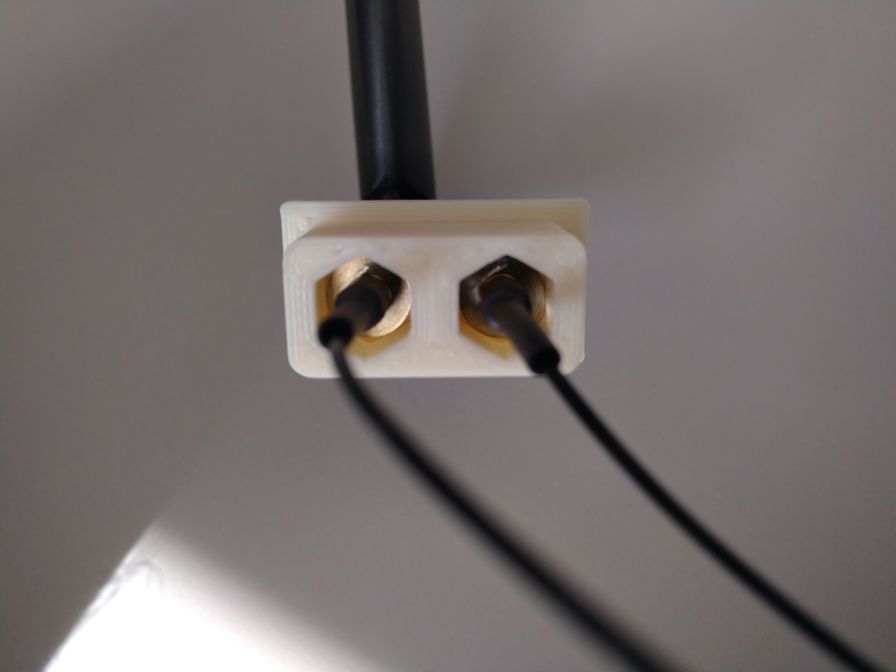 Isolator for SMA double socket.