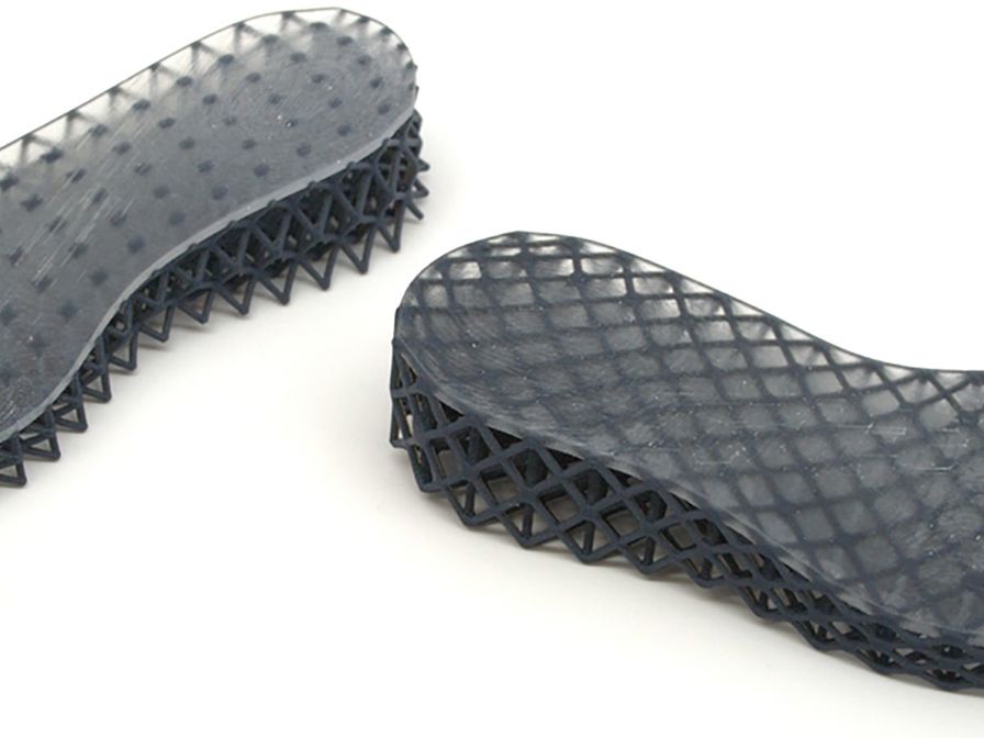 DManD researchers created multi-material soft-lattice structures for this footwear prototype using a custom design, analysis and slicer tools to spatially control stiffness.