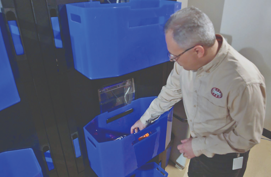 Completed parts are collected in the catch
bins.