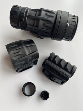 Disassembled 3D printed scope for a firearm printed by Stratasys
