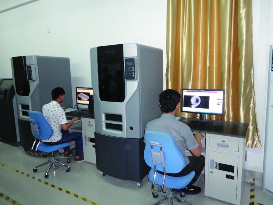 SDPI students working on 3D printed prototype designs.