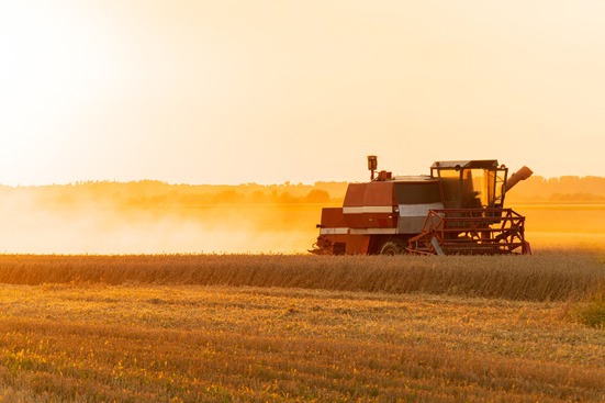Tractor working in field
