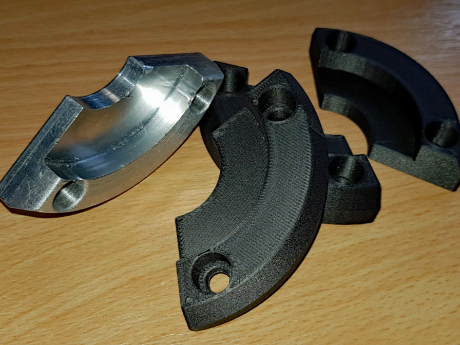 A 3D printed jaw accessory produced in FDM Nylon 12CF – these parts save up to 80% of machine setup time.