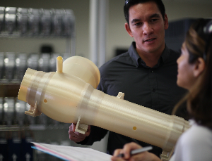 Man holding Victrex AM 200 part