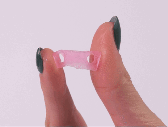 Dental gingiva mask being squeezed horizontally