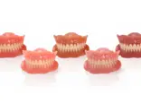 Stratasys TrueDent Dentures with 3D printed color variety