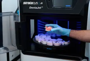 j5 dentajet hand holding truedent denture