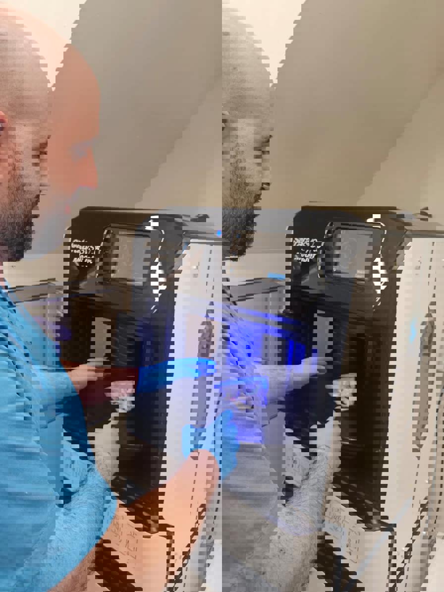 Surgeon reviewing model from Stratasys J5 DAP