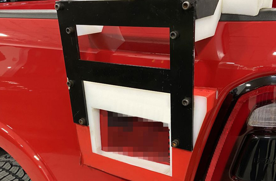 The previous tool configuration shown on a vehicle.